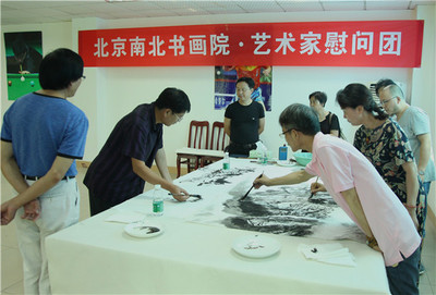 翰墨傳情暖警營 藝術(shù)交流勵紅妝——北京南北書畫院藝術(shù)家赴四川女子特警隊開展慰問交流活動